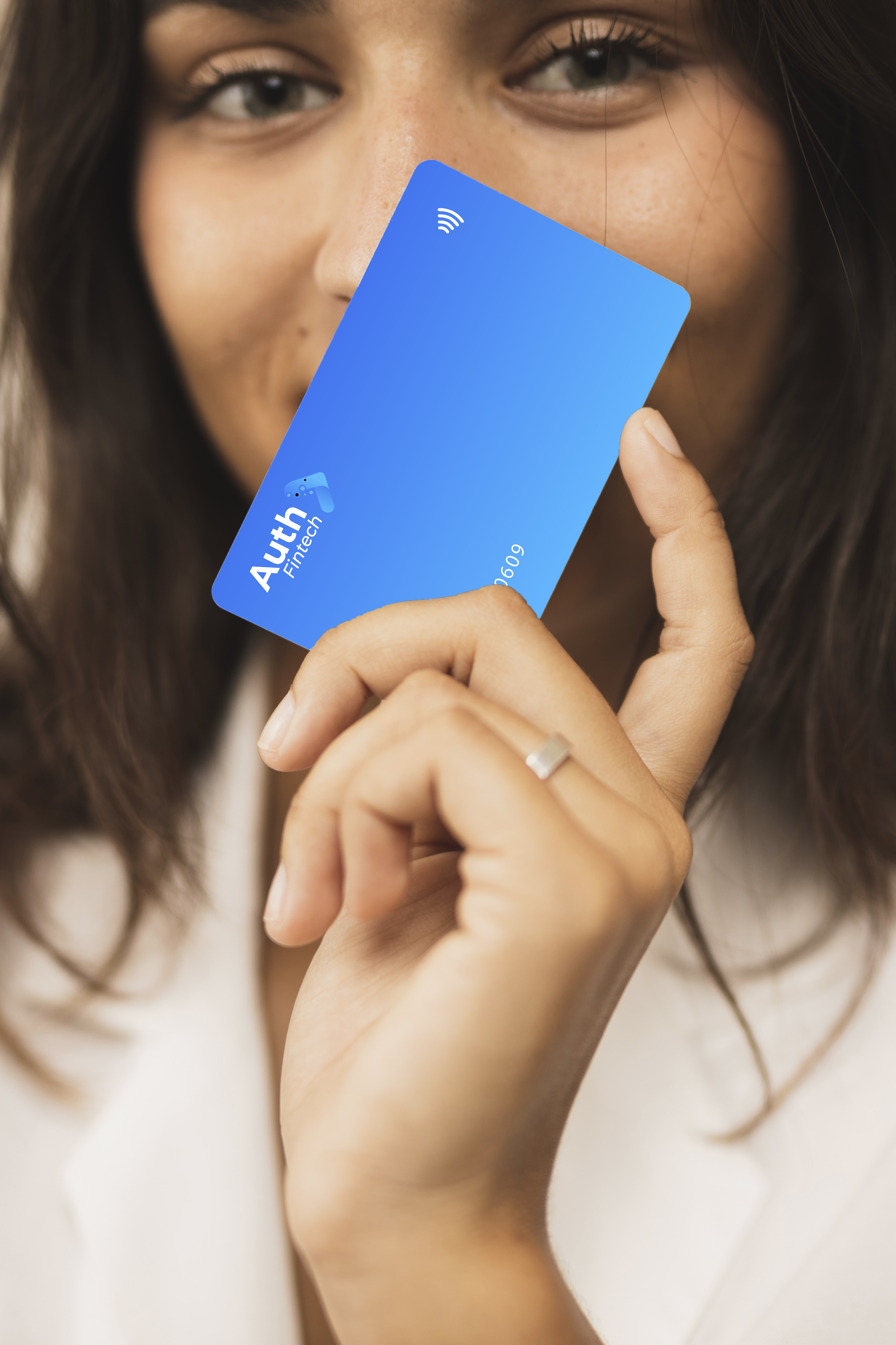 close-up-woman-holding-card-looking-camera (1)-1